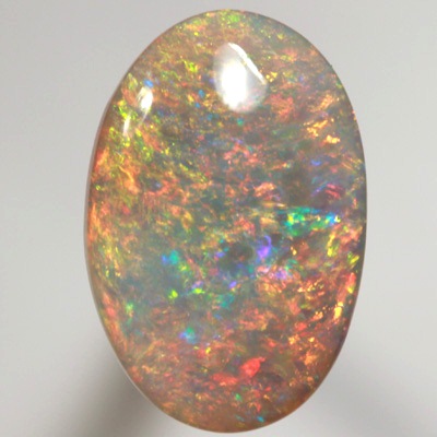 SOLID SEMI BLACK OPAL Top quality. Floral Harlequin pattern, very bright and sparkling golden multicolour. SEE VIDEO  